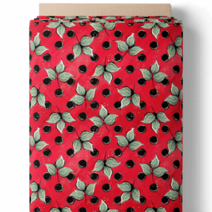Feuillage rouge et pois noirs